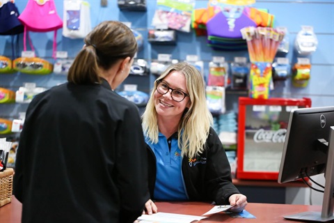 GRALC team member serving a customer